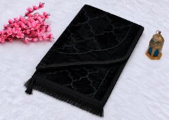 Minimalist-Black-Prayer-Rug-with-Blossoms-and-Lantern